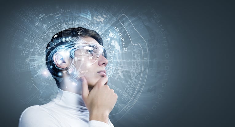 Young man wearing futuristic glasses against blue background-1