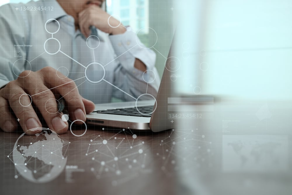 businessman hand working with modern technology and digital layer effect as business strategy concept-Oct-10-2025-07-22-19-5968-AM